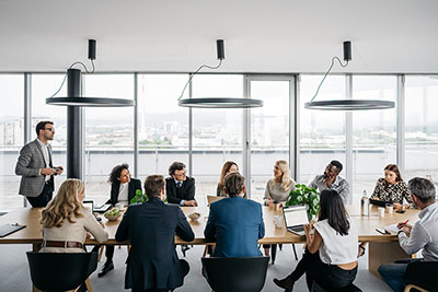 People having a discussion in a conference room