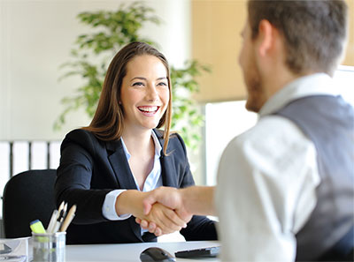 associate shaking hands with manager