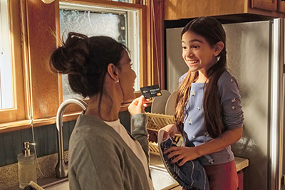 Daughter doing dishes
