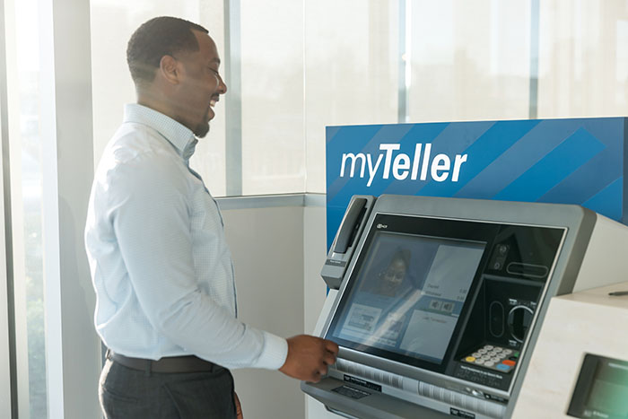 Trustmark customer using the myTeller machine.