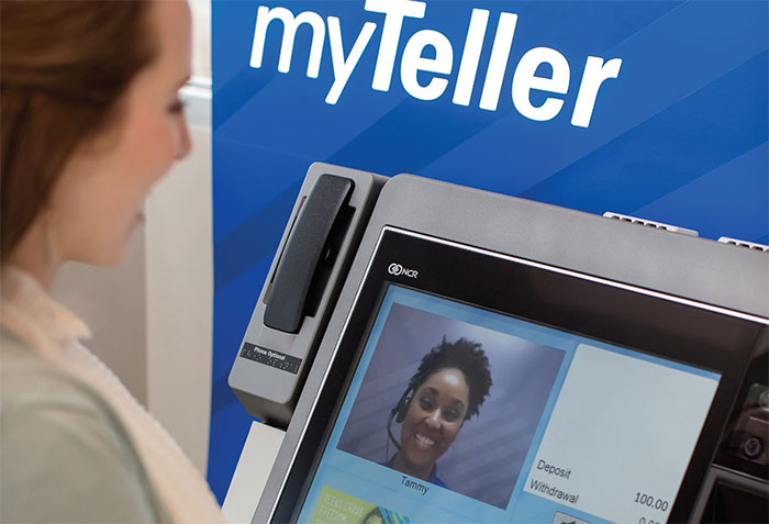 Trustmark customer using the myTeller machine.