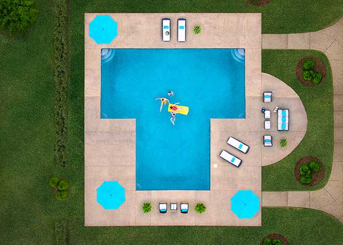 Swimming pool in back yard.