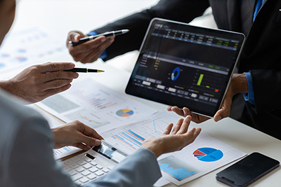 discussing figures on a tablet