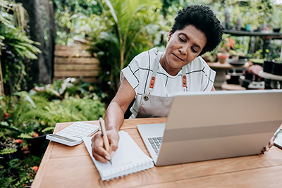 woman working on laptop in nursery